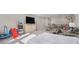 Spacious bonus room with a bed and entertainment center at 514 Perdue Trl, Canton, GA 30115