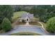 Clubhouse exterior featuring ample parking and well-maintained landscaping at 514 Perdue Trl, Canton, GA 30115