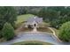 Aerial view of the community clubhouse with sidewalks and parking at 514 Perdue Trl, Canton, GA 30115