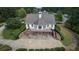 Stately home showing a patio, manicured landscaping, and spacious lot at 514 Perdue Trl, Canton, GA 30115
