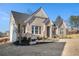 Beautiful brick home with well-maintained landscaping, a welcoming entrance and lovely curb appeal at 514 Perdue Trl, Canton, GA 30115