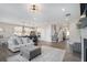 Spacious open-concept living area with seamless flow into the kitchen and dining areas, and abundant natural light at 514 Perdue Trl, Canton, GA 30115