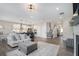 Open concept living area with kitchen and stairs at 514 Perdue Trl, Canton, GA 30115