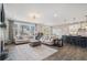 Open-concept living area with modern finishes, ample seating, and a combined living and dining space at 514 Perdue Trl, Canton, GA 30115