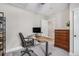 Functional office space with a sleek desk, comfortable chair, and ample storage at 514 Perdue Trl, Canton, GA 30115