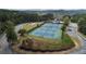 Community features beautiful tennis courts, playground, gazebo, and walking paths surrounded by lush trees at 514 Perdue Trl, Canton, GA 30115