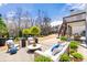 Backyard patio with outdoor seating, landscaping, and a cozy area for entertaining guests at 1251 Irwin Lake Way, Marietta, GA 30064