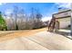 Spacious backyard with large deck and stairs leading to the house at 1251 Irwin Lake Way, Marietta, GA 30064