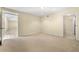 Unfinished basement with tile floors and multiple entryways at 1251 Irwin Lake Way, Marietta, GA 30064