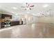 Open floor plan basement kitchen with stainless steel appliances and tile floors at 1251 Irwin Lake Way, Marietta, GA 30064
