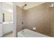 Full bathroom with shower/tub combo and tile surround at 1251 Irwin Lake Way, Marietta, GA 30064