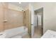 Bathroom with a shower/tub combo and tile surround at 1251 Irwin Lake Way, Marietta, GA 30064