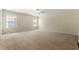 Spacious bedroom with neutral carpeting and ample natural light at 1251 Irwin Lake Way, Marietta, GA 30064