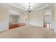Bright dining room with hardwood floors and a chandelier at 1251 Irwin Lake Way, Marietta, GA 30064