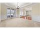 Dining room with hardwood floor and chandelier at 1251 Irwin Lake Way, Marietta, GA 30064