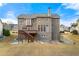 Two-story house with deck, stairs, and large backyard at 1251 Irwin Lake Way, Marietta, GA 30064