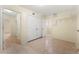 Laundry area with built-in storage and tile flooring at 1251 Irwin Lake Way, Marietta, GA 30064