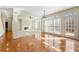 Spacious living room with hardwood floors, fireplace, and large windows at 1251 Irwin Lake Way, Marietta, GA 30064