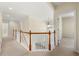 Bright upper hallway with a view of the two-story foyer at 1251 Irwin Lake Way, Marietta, GA 30064