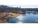 Picturesque view of lakefront property and golf course at 5152 Boulder Bluff Way, Suwanee, GA 30024