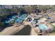 Community features tennis courts and clubhouse near lake at 5152 Boulder Bluff Way, Suwanee, GA 30024