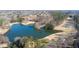 Community overview featuring a lake and golf course at 5152 Boulder Bluff Way, Suwanee, GA 30024