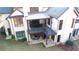 Spacious multi-level deck with stone patio below at 5152 Boulder Bluff Way, Suwanee, GA 30024
