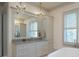 Bathroom with double vanity, large mirror, and walk-in shower at 5152 Boulder Bluff Way, Suwanee, GA 30024
