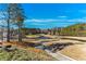 Stunning view of the golf course and lake at 5152 Boulder Bluff Way, Suwanee, GA 30024