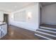 Upstairs hallway with hardwood floors and built-in window seat at 5152 Boulder Bluff Way, Suwanee, GA 30024