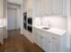 Well-equipped kitchen with built-in appliances and ample cabinetry at 5152 Boulder Bluff Way, Suwanee, GA 30024