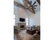 Bright living room with stone fireplace, high ceilings, and large windows at 5152 Boulder Bluff Way, Suwanee, GA 30024