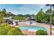 Community pool with a waterslide and play area at 5152 Boulder Bluff Way, Suwanee, GA 30024