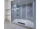 Large walk-in shower with pebble floor and glass enclosure at 5152 Boulder Bluff Way, Suwanee, GA 30024