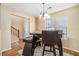 Bright dining area with a chandelier and access to the front foyer at 4211 Wingfoot Ct, Decatur, GA 30035