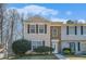 Charming two-story townhome with light siding, brick accents, and a well-manicured lawn at 4211 Wingfoot Ct, Decatur, GA 30035