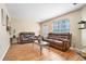 Spacious living room with hardwood floors, two sofas, and natural light at 4211 Wingfoot Ct, Decatur, GA 30035
