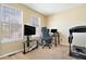 Home office featuring dual monitors, a computer chair, and a treadmill at 4211 Wingfoot Ct, Decatur, GA 30035