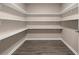 Walk-in pantry with ample shelving for storage at 210 Bluff Creek Dr, Woodstock, GA 30188