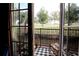 Charming balcony with an American flag offers serene cemetery views at 351 Washington Ne Ave # 208, Marietta, GA 30060