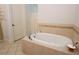 Bathroom featuring a modern jetted tub at 351 Washington Ne Ave # 208, Marietta, GA 30060