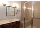 Modern bathroom with a glass enclosed shower and wooden vanity at 351 Washington Ne Ave # 208, Marietta, GA 30060