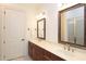 Bathroom showcasing a dual vanity, large mirror, and glass shower at 351 Washington Ne Ave # 208, Marietta, GA 30060