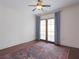 Bedroom with hardwood floors, rug, ceiling fan and french doors leading to the outside at 351 Washington Ne Ave # 208, Marietta, GA 30060