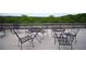 Outdoor deck with tables and chairs showcasing views of lush greenery at 351 Washington Ne Ave # 208, Marietta, GA 30060
