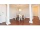 Bright dining room with hardwood floors and modern chandelier at 351 Washington Ne Ave # 208, Marietta, GA 30060