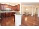 Open kitchen featuring granite countertops and stainless steel appliances next to dining area at 351 Washington Ne Ave # 208, Marietta, GA 30060
