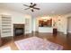 Elegant living room with a fireplace, built-in bookshelves, and an open layout at 351 Washington Ne Ave # 208, Marietta, GA 30060