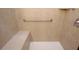 Tiled shower with built-in bench and grab bar at 351 Washington Ne Ave # 208, Marietta, GA 30060