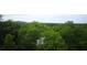 Lush green trees surround a house, offering a tranquil environment at 351 Washington Ne Ave # 208, Marietta, GA 30060